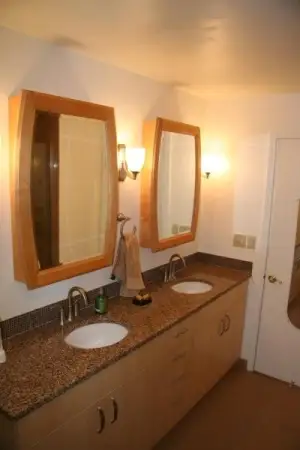 photo of a set of sinks for two people to use at the same time.