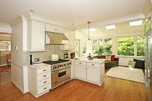 photo of a kitchen remodel with new counters and floors but from a different angle